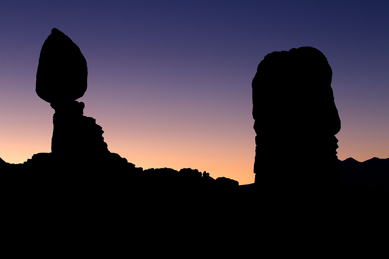 Balanced Rock silhouete (left) in Arches National Park â€¦ September 2010