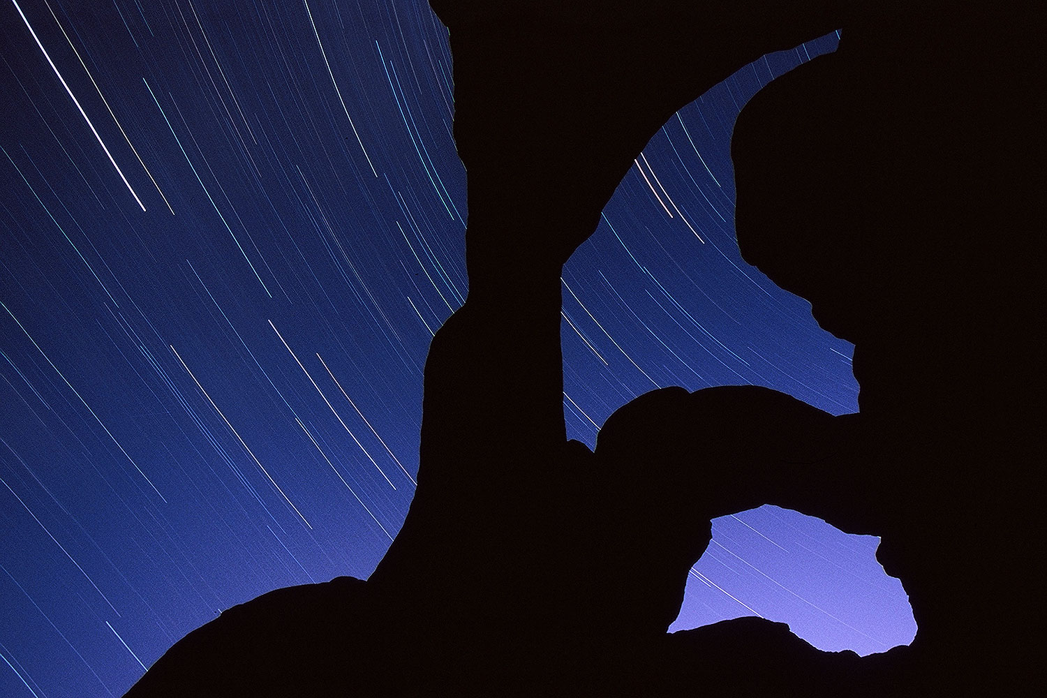 2 hours of star trails in the sky looking through the Double Arch in Arches National Park â€¦ September 2010